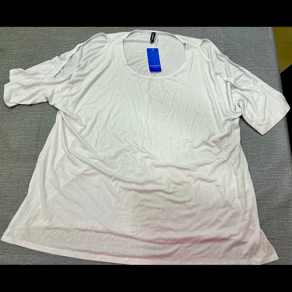 Plus size white quarter sleeve shirt with key holes on sleeves